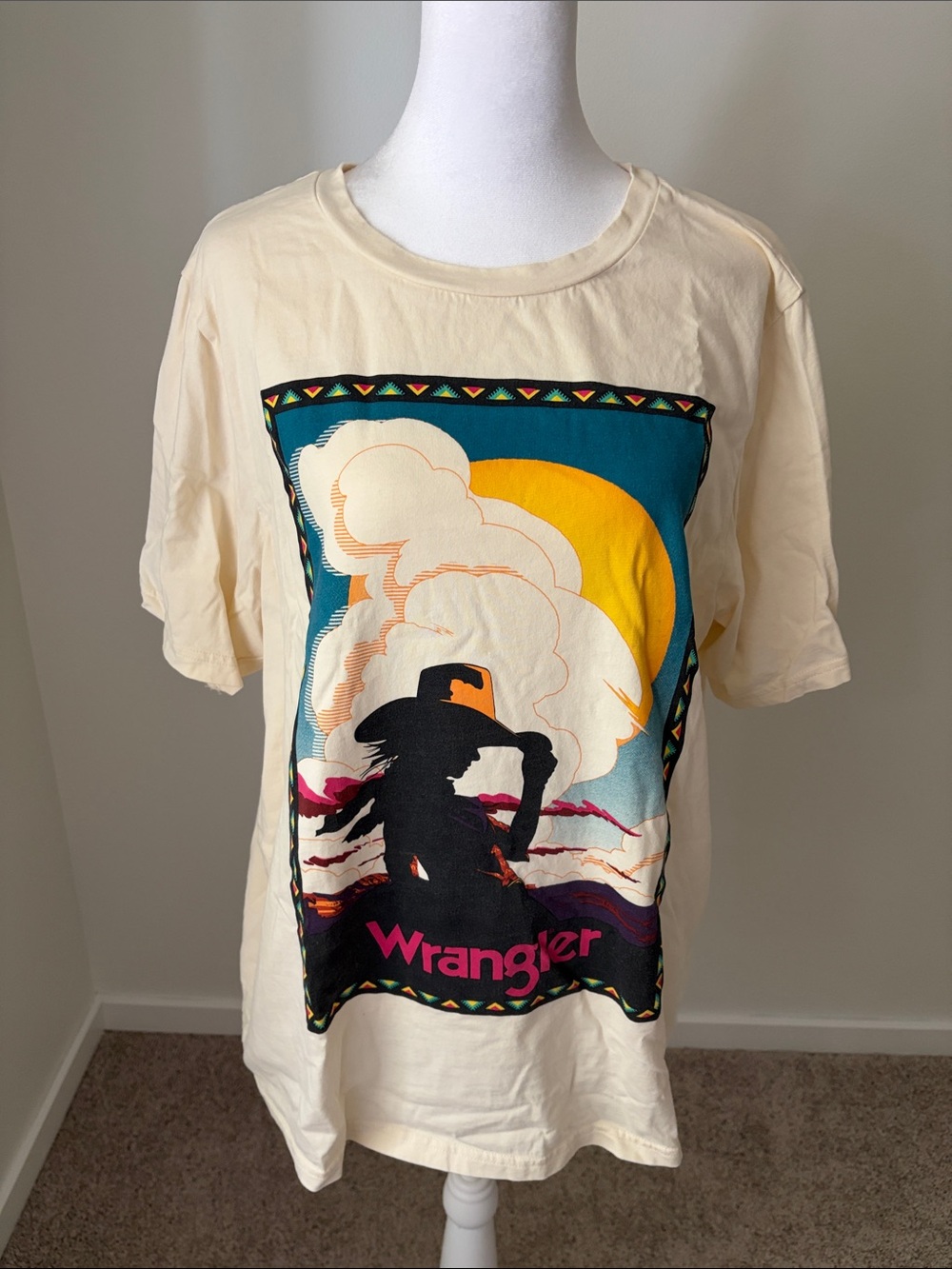Wrangler Cream Tee with Multicolor Sunset Cowboy Graphic